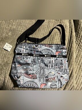 Lesportsac Women’s Messenger crossbody bag in Gray with Black Strap